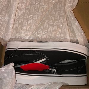 Black and White slip on Vans